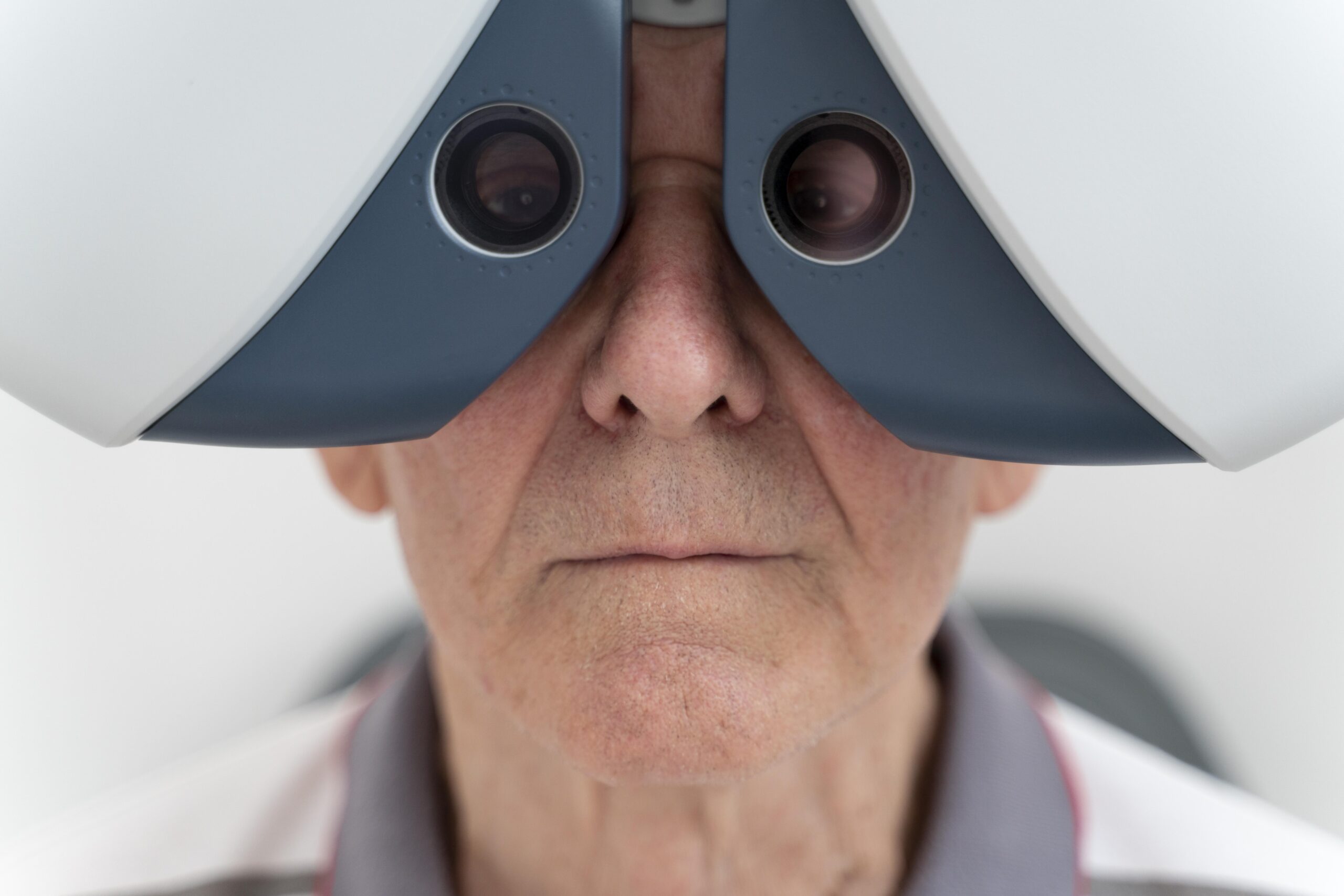 man having ophthalmology checking